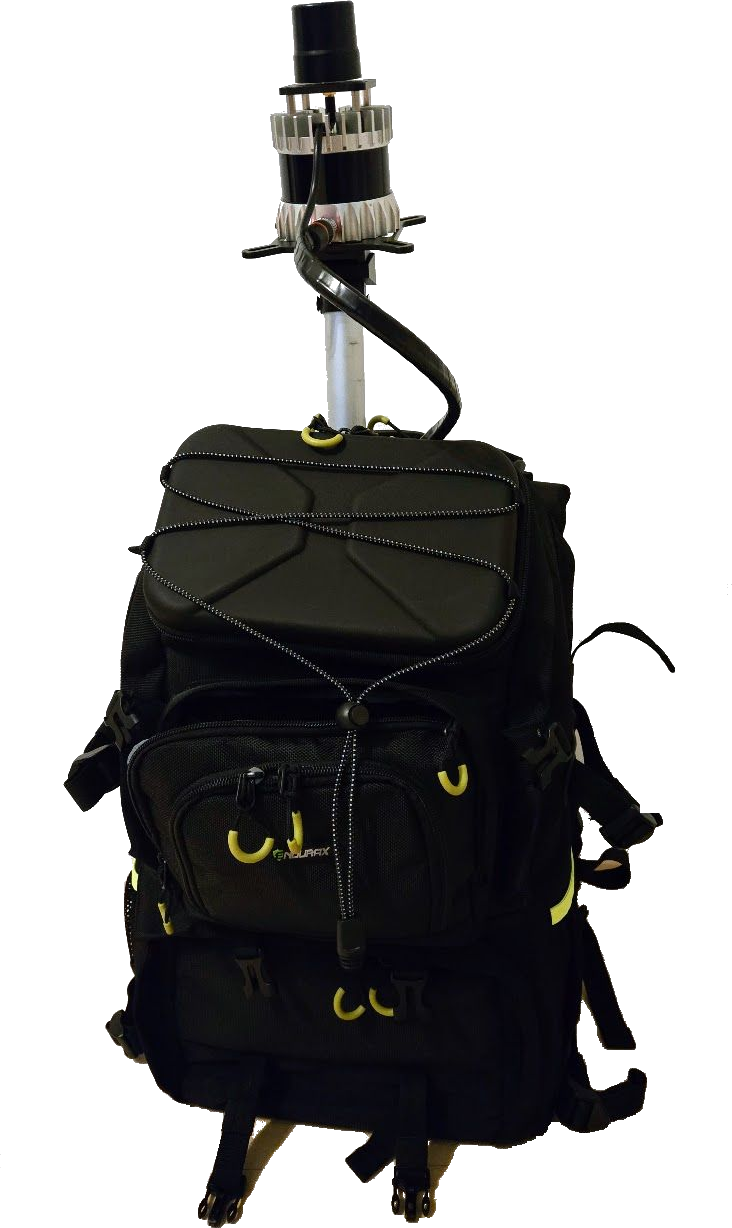 The backpack scanner: an Ouster LiDAR on a mast above a black backpack carrying the compute unit and battery.